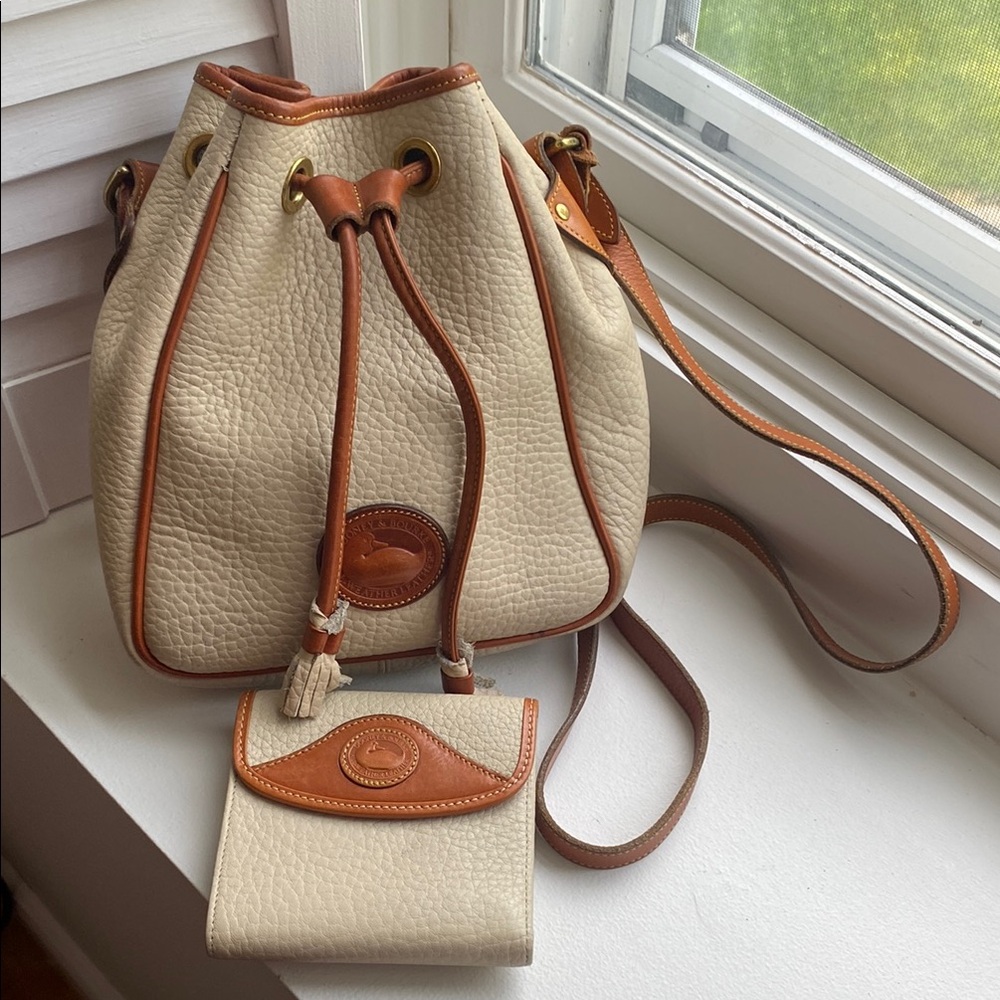 Dooney & Bourke Cream and Tan Leather Bucket Bag and matching wallet